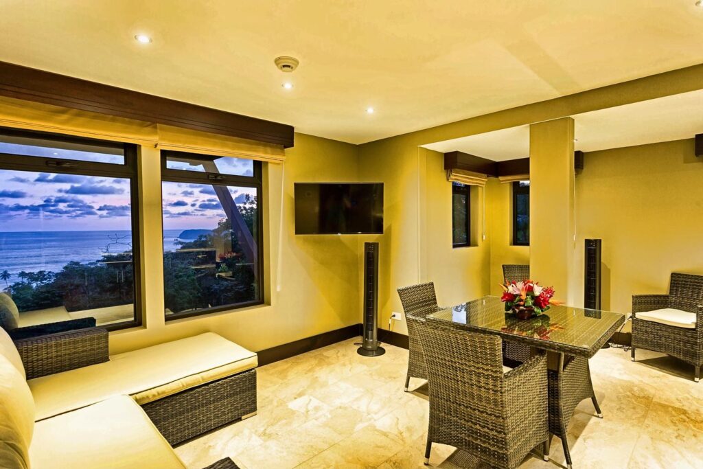 Unwind indoors with floor-to-ceiling windows framing the Pacific.