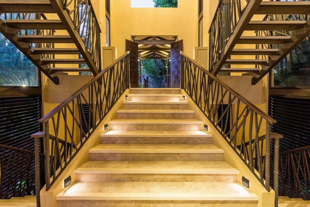 Grand stairways and modern design welcome you into this Manuel Antonio Oceanfront-luxury-villa-for-large-groups