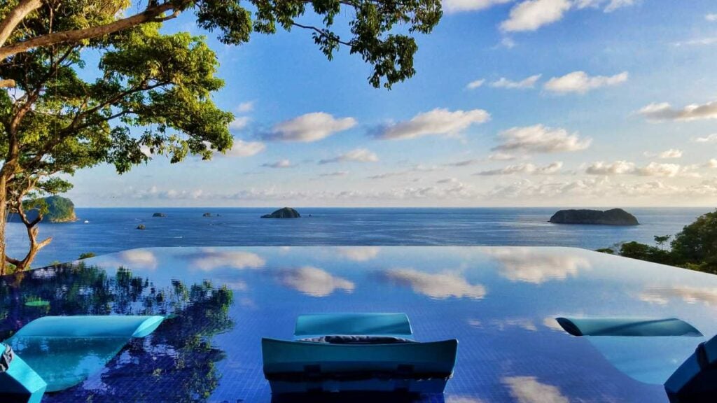 An endless horizon of blue — where the infinity pool and Pacific Ocean become one.