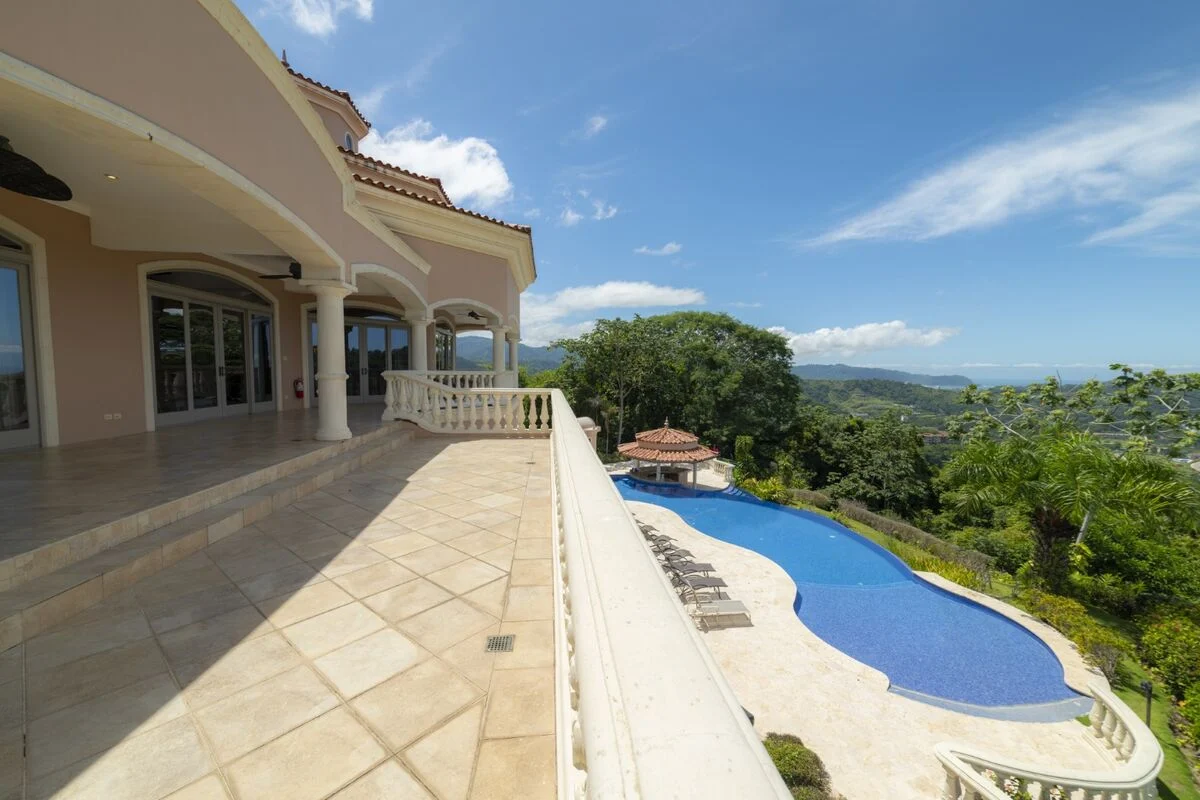 luxury villa terrace in los suenos with infinity pool ocean view and outdoor seating