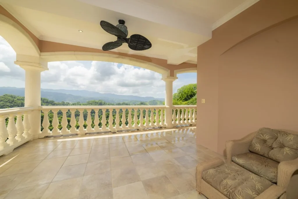 A private terrace with open-air seating and sweeping mountain views, ideal for quiet moments and relaxation.