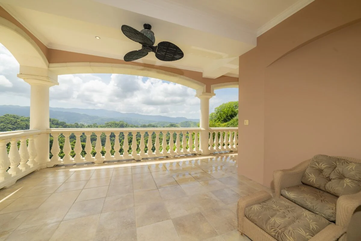 luxury villa private terrace in los suenos with mountain view covered balcony and seating