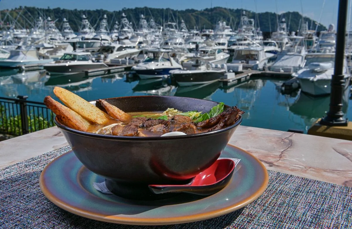 gourmet dish los suenos marina waterfront dining costa rica boats harbor view