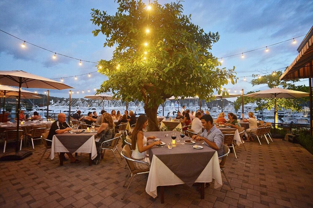 Dining under the lights at Los Sueños Marina, where evenings unfold by the water.
