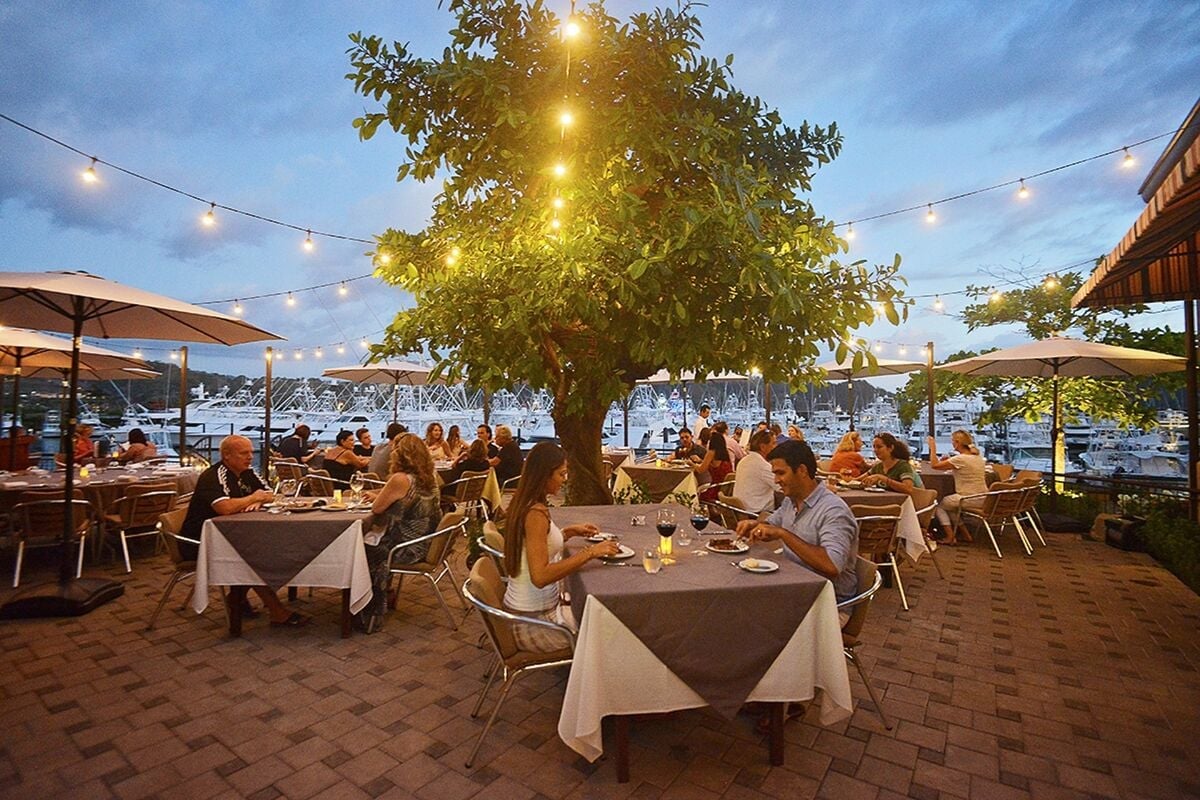 los suenos marina outdoor dining evening lights restaurant costa rica waterfront