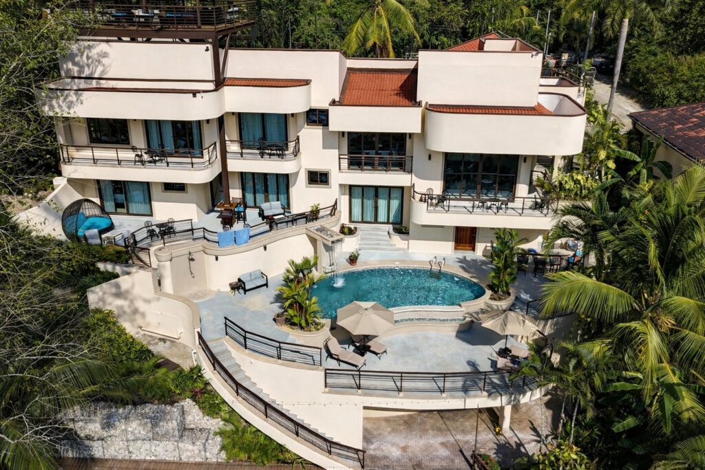 Aerial view of a luxury beachfront vacation villa with private pool on Costa Rica's Pacific coast