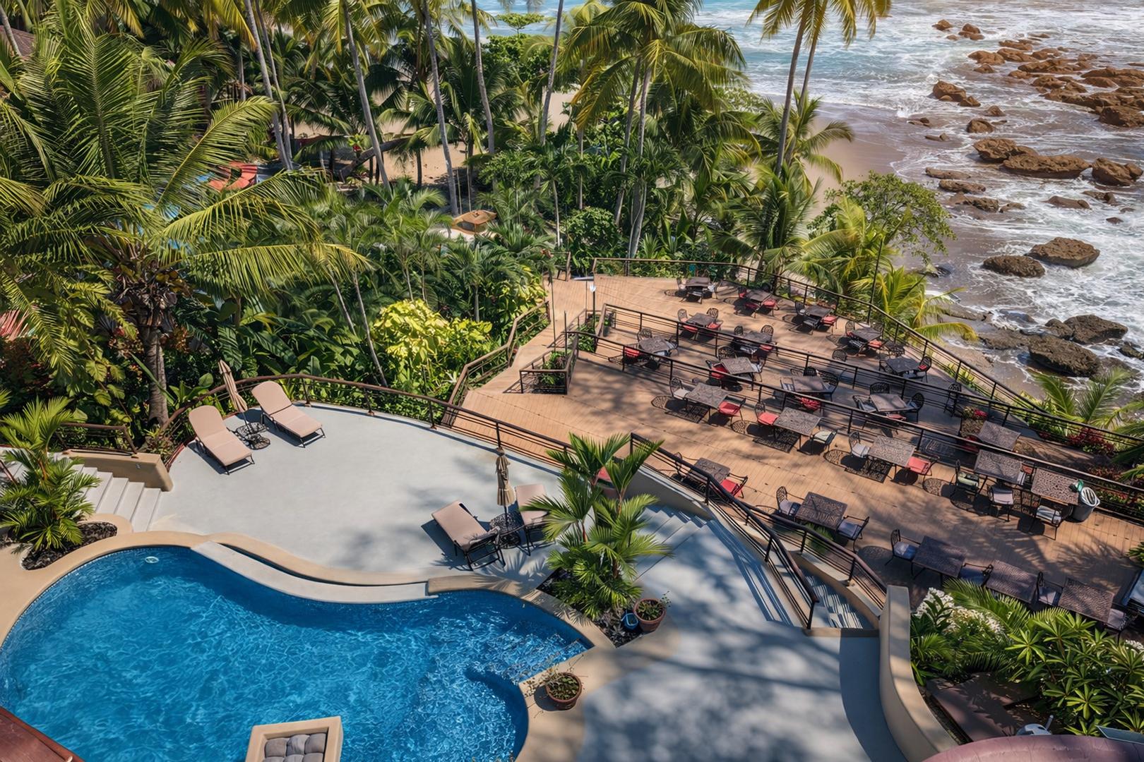 Oceanfront swimming pool and sun terrace at a luxury beachfront vacation villa in Costa Rica