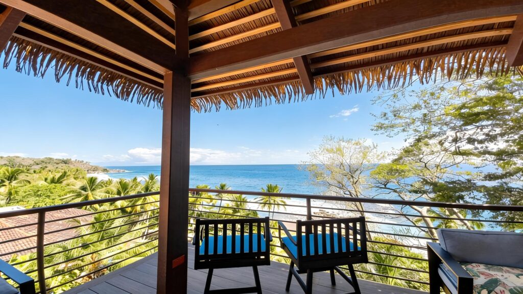 Covered terrace overlooking the Pacific Ocean at a luxury beachfront vacation villa in Costa Rica