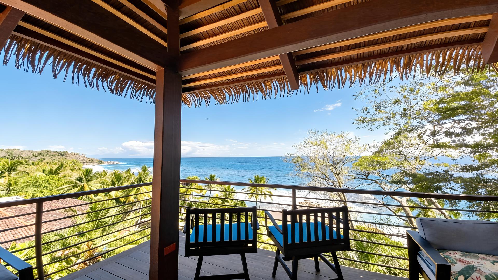 Covered terrace overlooking the Pacific Ocean at a luxury beachfront vacation villa in Costa Rica