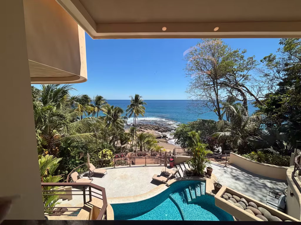 Enjoy panoramic views of the Pacific Ocean from the pool terrace, where tropical gardens and the beach are just steps away.