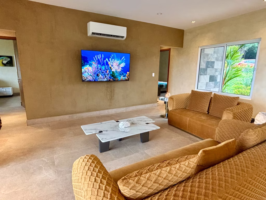 Comfortable seating and a large television create a welcoming space for relaxing together after outdoor adventures.